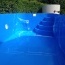 Zaoblený bazén s rohovými schody a osvetlením